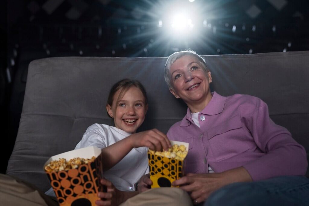 une séance de cinéma à la maison avec une sélection de films de Noël pour votre maman